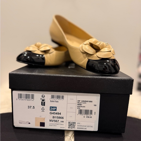 CHANEL Shoes - CHANEL Beige Leather Ballet Flats with Black Patent Cap Toe and Camellia